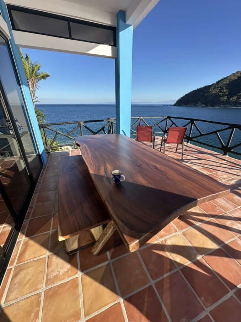 Outdoor dining table over the bay