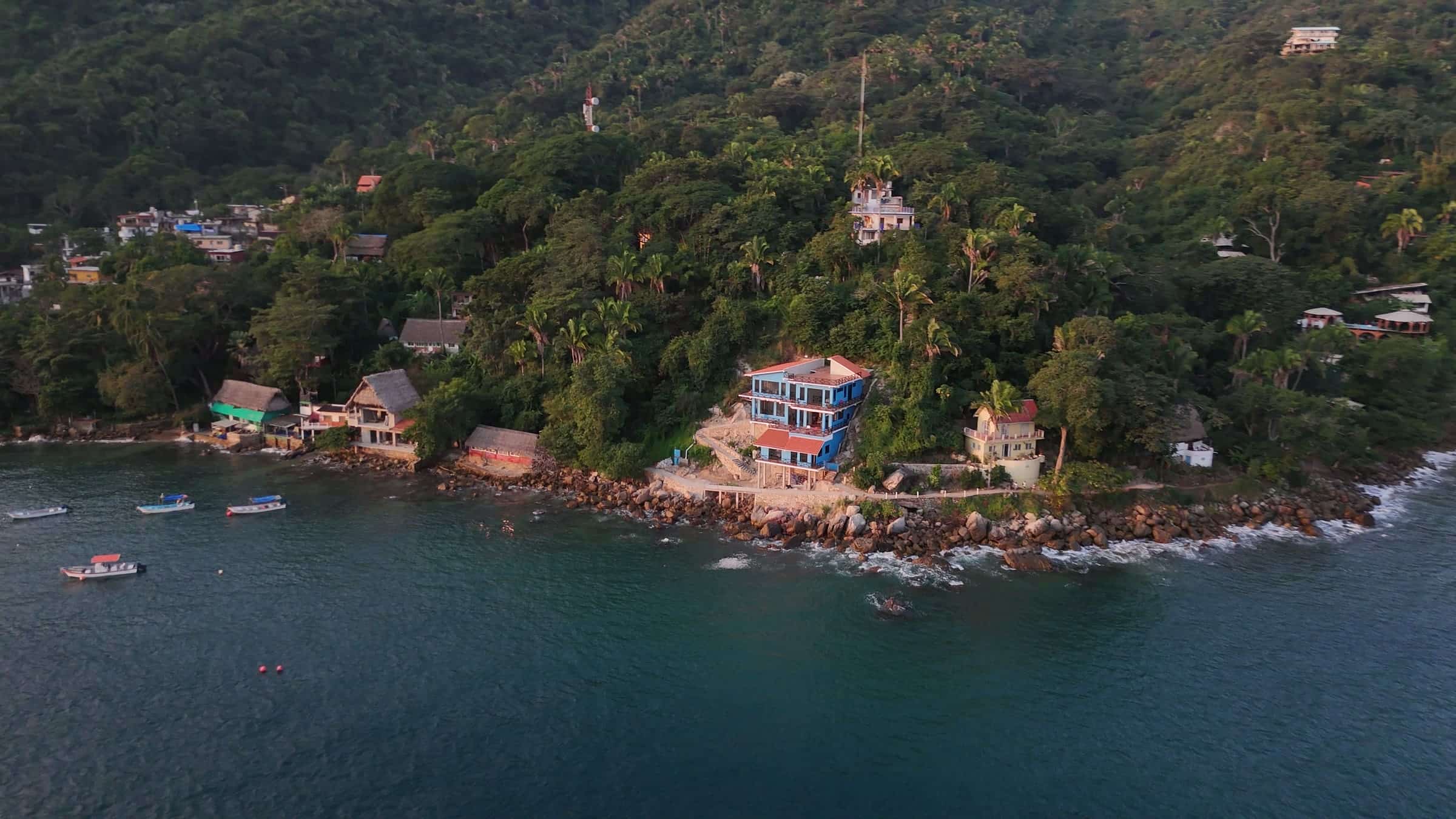 Morning light on the house and the bay